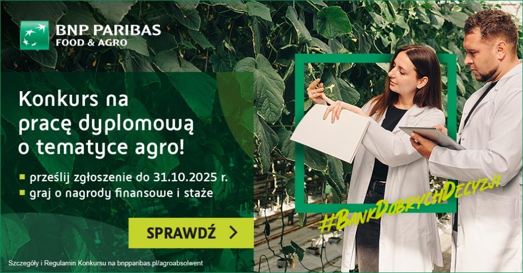 Kobieta i mężczyzna w białych fartuchach stoją przy zielonym krzewie