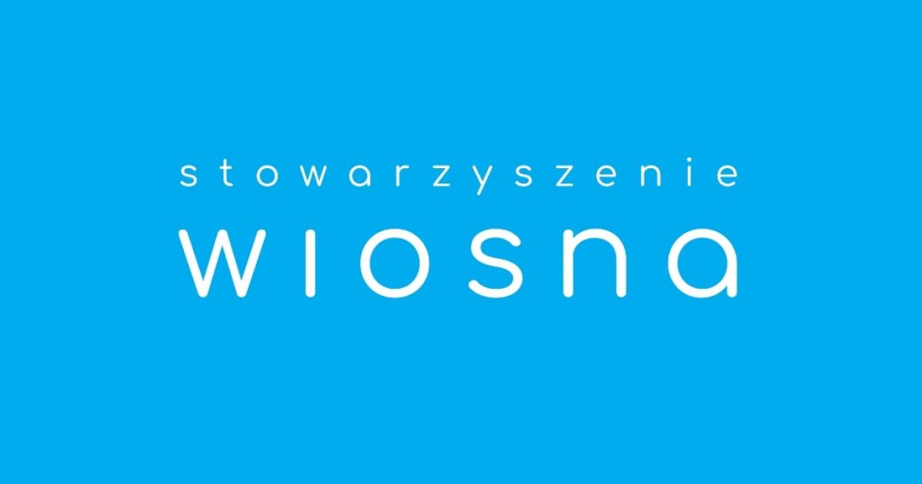Logo stowarzyszenia wiosna na niebieskim tle
